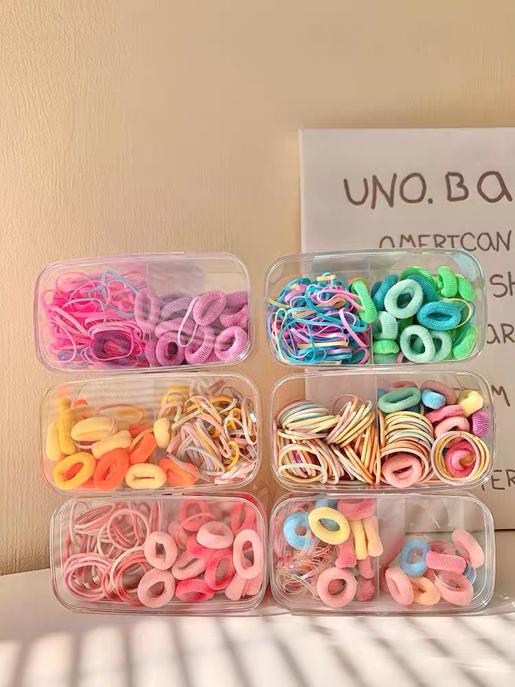 Colitas de Pelo en Caja