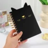 Cuaderno anillado oreja de gato